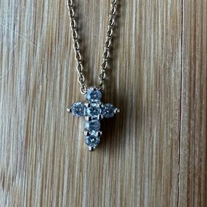 Roberto Coin UNIQUE TWO TONE diamond tiny cross necklace.